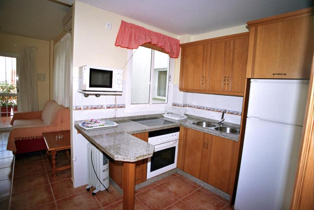 Apartamentos La Casa Del Barrio Maro Camera foto