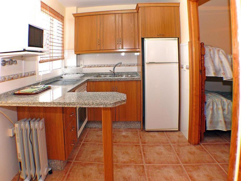 Apartamentos La Casa Del Barrio Maro Camera foto