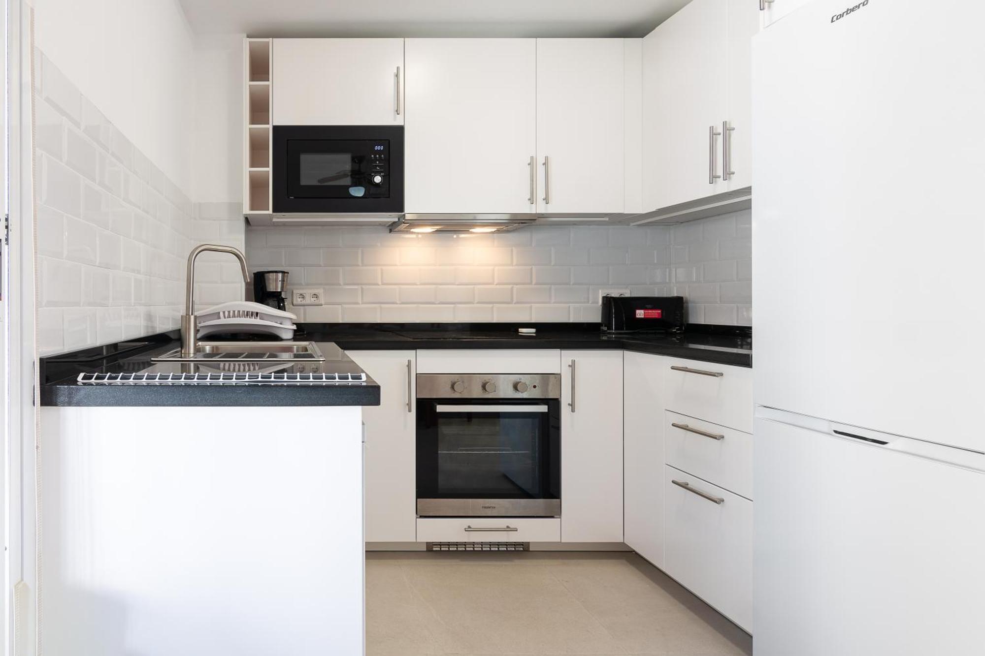 Apartamentos La Casa Del Barrio Maro Esterno foto